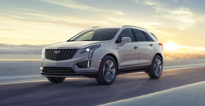 2026 Cadillac XT5 interior with touchscreen display, wireless smartphone connectivity, and premium Bose audio system