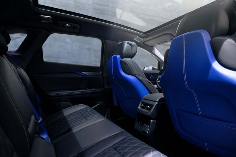 Back Seat View of the 2026 OPTIQ-V Blue Front Seats, Sun Roof, and Interior | Hudson Cadillac in Poughkeepsie NY
